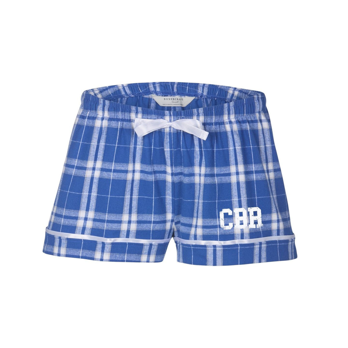 Blue and white plaid pajama shorts with white ribbon trim and CBR lettering