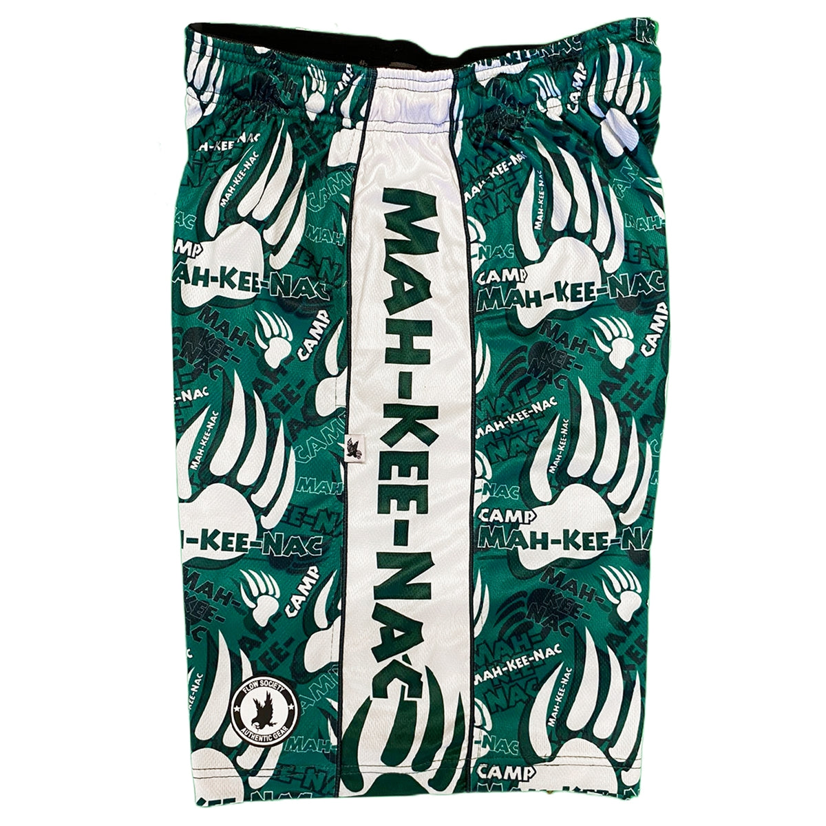 Green and white athletic shorts with Mah-Kee-Nac text and bear paw print pattern