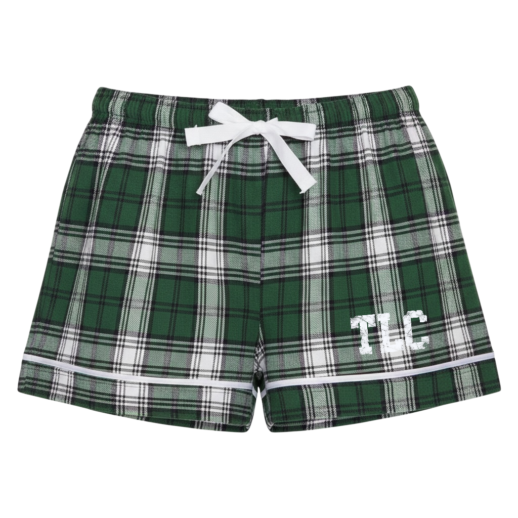 Green and white plaid pajama shorts with white drawstring and TLC graphic