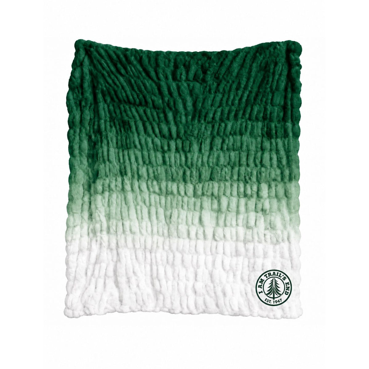 Green and white ombre textured throw blanket with Trail's End logo patch