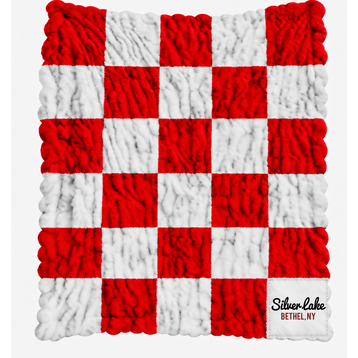Red and white checkered plush blanket with a Silver Lake Bethel NY brand patch