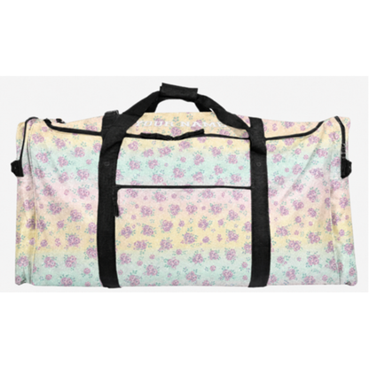 Duffle bag with pastel floral pattern and black straps