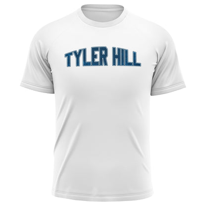 White short sleeve performance t-shirt with Tyler Hill text in blue block lettering on the chest