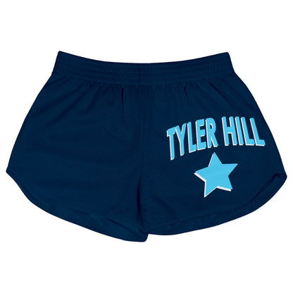 Navy blue mesh athletic shorts with Tyler Hill text and a light blue star graphic