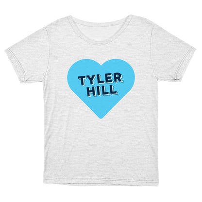 Light grey t-shirt with a blue heart graphic containing the text Tyler Hill