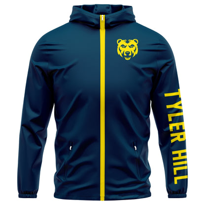 Navy blue hooded windbreaker with yellow zipper and Tyler Hill text on sleeve